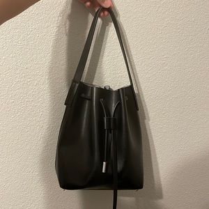 black leather bucket handbag